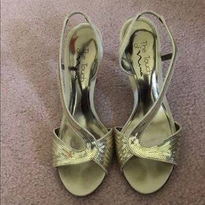 Gold high heels